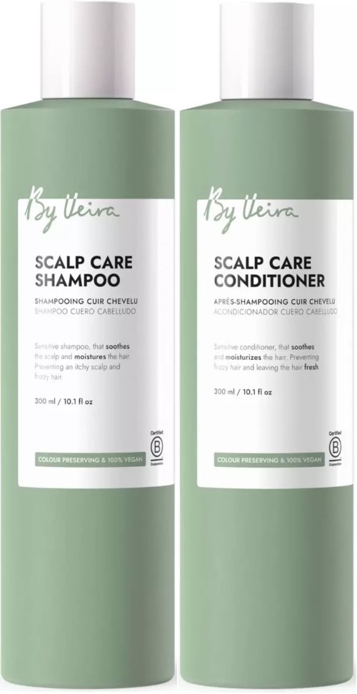 Two green bottles of scalp care shampoo and conditioner with white caps, labeled with product details.