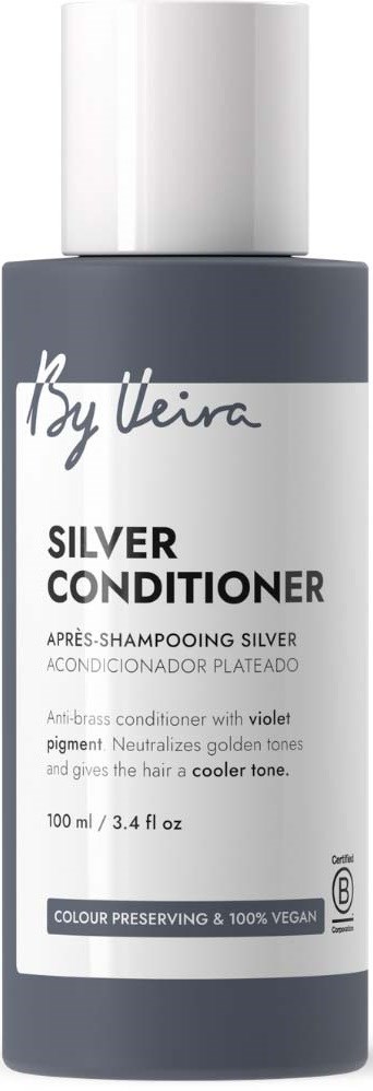A gray bottle of By Weira Silver Conditioner with white cap, label showing product details and a blue banner.