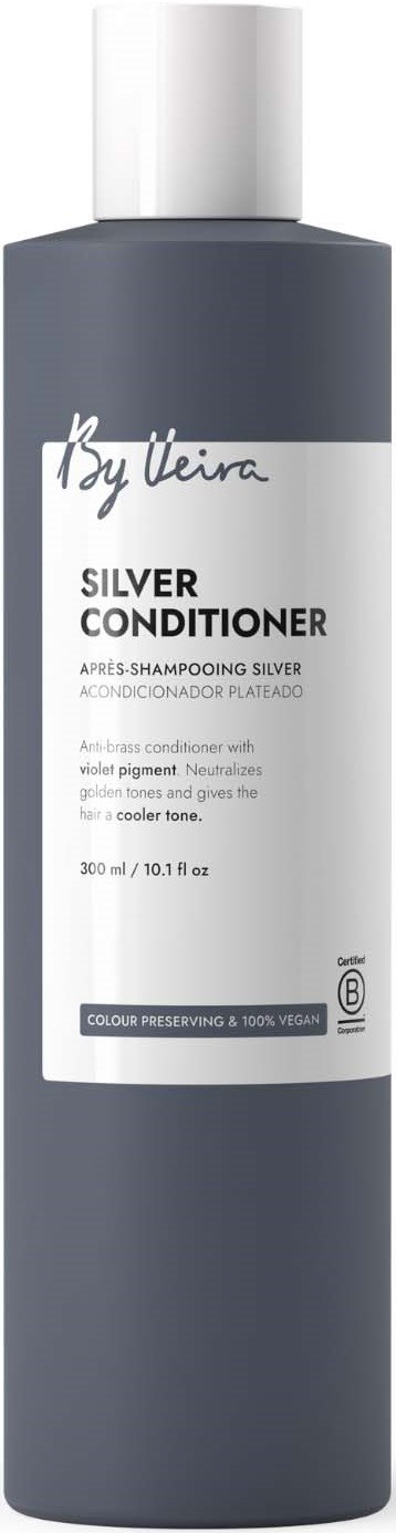 A tall gray bottle of silver conditioner with a white label and white cap, featuring brand and product details.