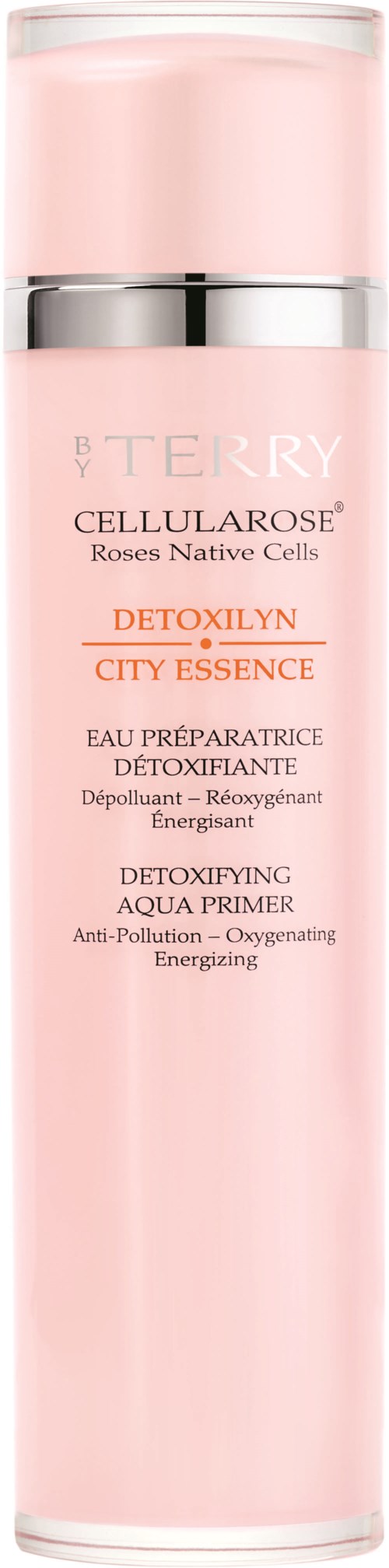 En lång rosa flaska med silverband, märkt som Detoxilyn City Essence, en hudvårdsprodukt för avgiftning och energi.