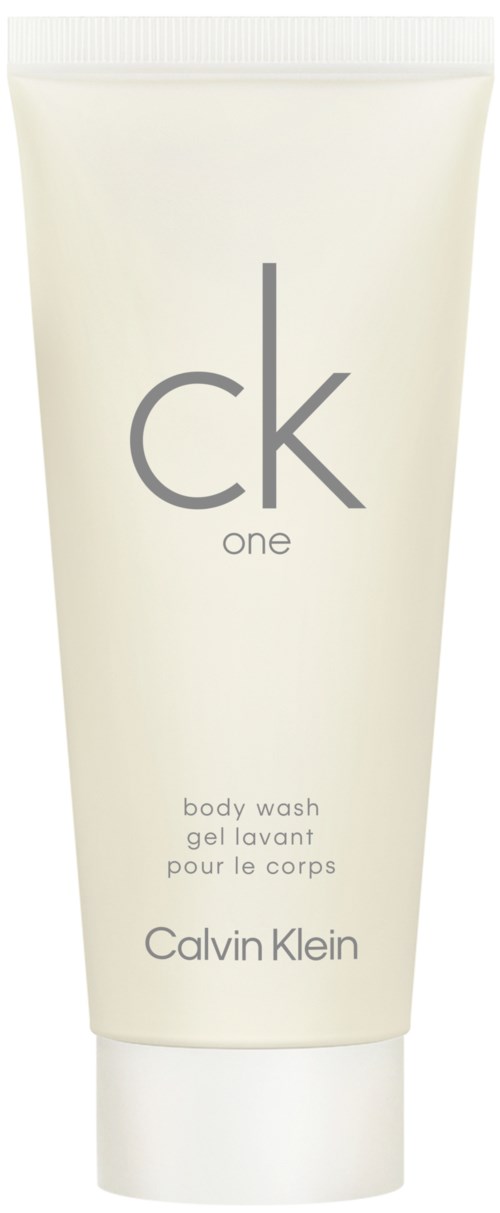 En vit tub med grå text som säger 'ck one' och 'Calvin Klein'. Det är en kroppsvårdsprodukt.