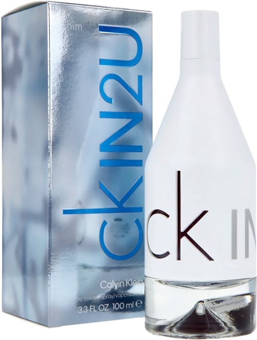 A perfume bottle with a white design and a silver box with blue text reading 'CK IN2U'.
