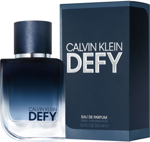 Een Calvin Klein Defy parfumfles en doos, donkerblauw ontwerp, witte tekst, geur is Eau de Parfum.