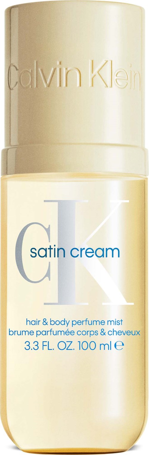 Een fles Calvin Klein satin cream geur spray voor haar en lichaam met beige dop en licht gekleurd lichaam.