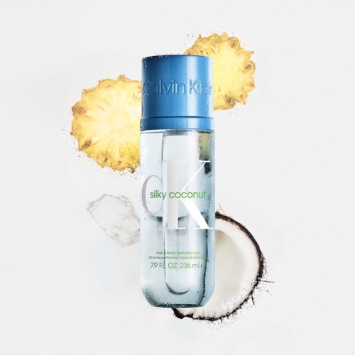 Calvin Klein silky coconut geurspray met kokos, ananas en kokosnootschil eromheen.