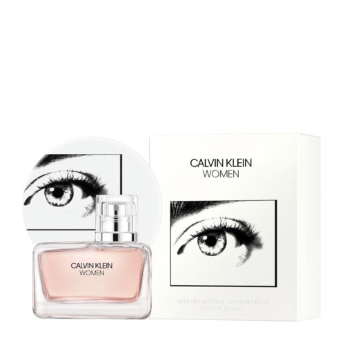 Ein Parfümflasche und eine Packung mit schwarzer und weißer Augendarstellung und dem Text 'Calvin Klein Women'.