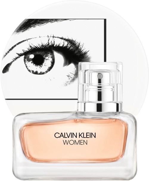 A Calvin Klein Women perfume bottle in front of a black-and-white eye illustration.
