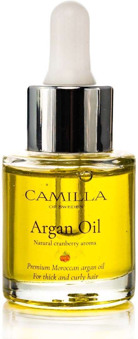 A small glass bottle of yellow argan oil with a white dropper cap, labeled 'Camilla' with details about the product.