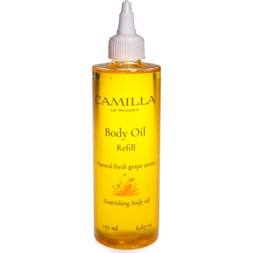 En gul flaske med spray inneholder kroppsolje. Den sier 'Camilla of Sweden' med drueduft.