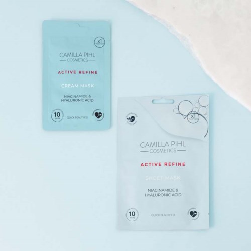 To ansiktsmaskepakker fra Camilla Pihl Cosmetics, merket Active Refine med ingredienser som niacinamide og hyaluronsyre.