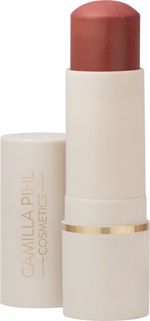 Beige huultenrajausputki, jossa on kultainen ympyrä ja tekstissä Camilla Phil Cosmetics.