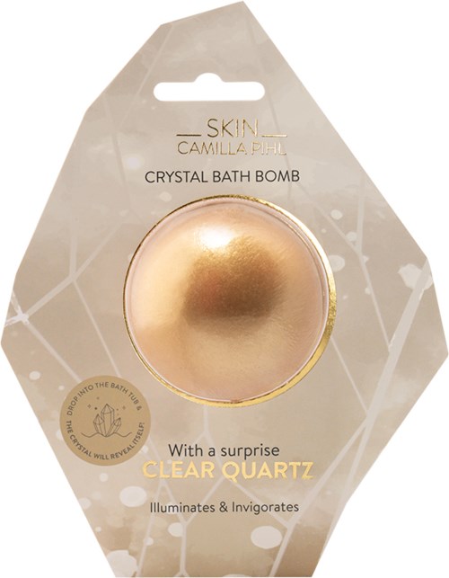 Ympyrämäinen, kultainen kylpykupla selkeässä pakkauksessa kultaisella ja valkoisella suunnittelulla, merkitty "CRYSTAL BATH BOMB" ja "CLEAR QUARTZ."