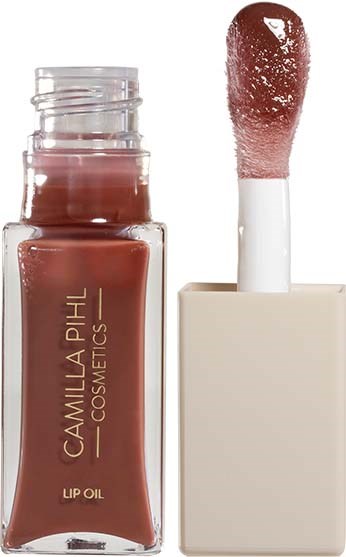 Lip gloss or oil in a clear bottle with a light pink color and a cotton swab applicator.