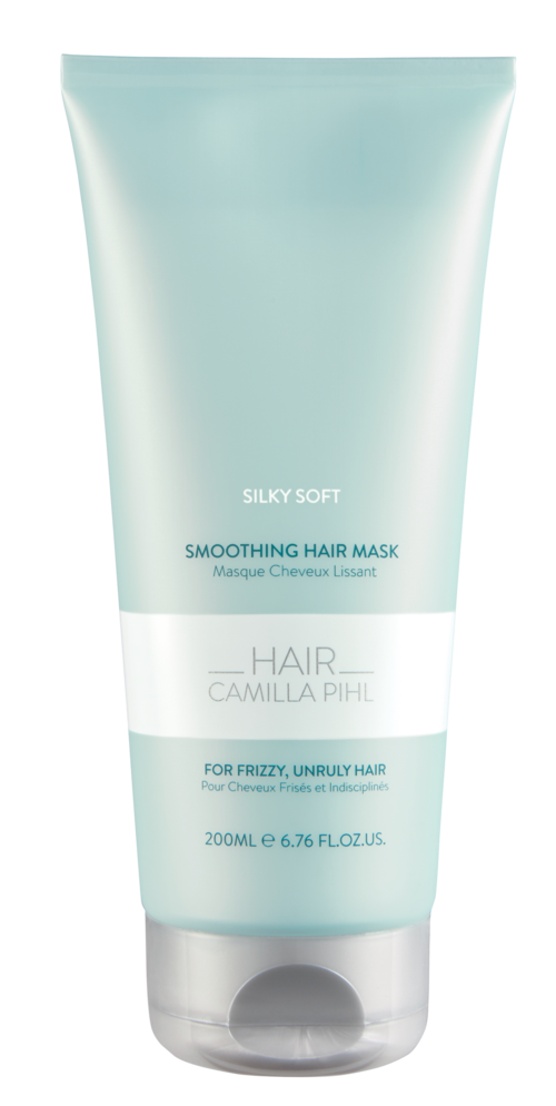 En lys grå tube med hårkur for kruset, uregjerlig hår, merket 'Silky Soft' og 'Smoothing Hair Mask.'