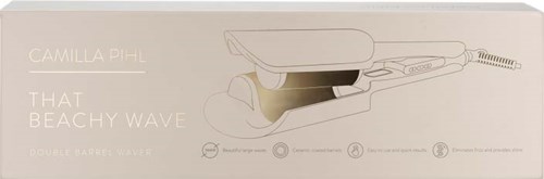 Boxen visar en hårstylingsenhet som heter Camilla Pihl That Beachy Wave, med enkel illustration och viktiga funktioner listade.