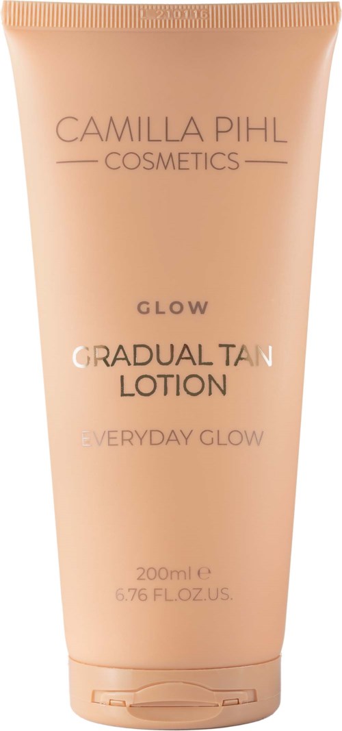 A beige tube of Camilla Pihl Cosmetics Glow Gradual Tan Lotion for everyday glow, 200ml size.