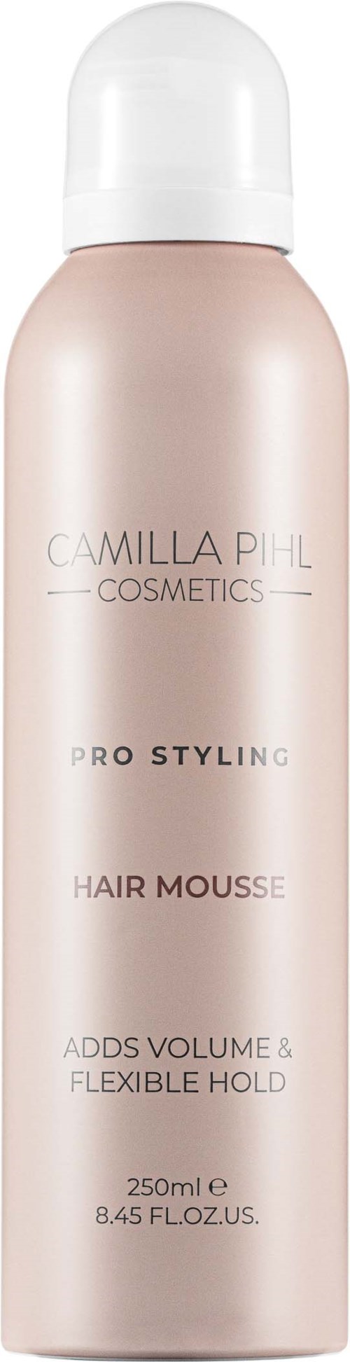 En rosa og hvit flaske med hårmousse fra Camilla Pihl Cosmetics, 250 ml stor.