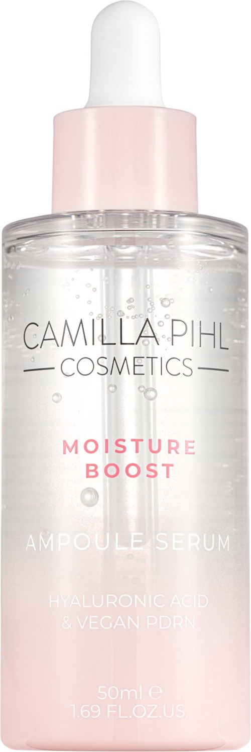 A clear serum bottle with a white dropper cap, labeled with products for skincare by Camilla Phil Cosmetics.