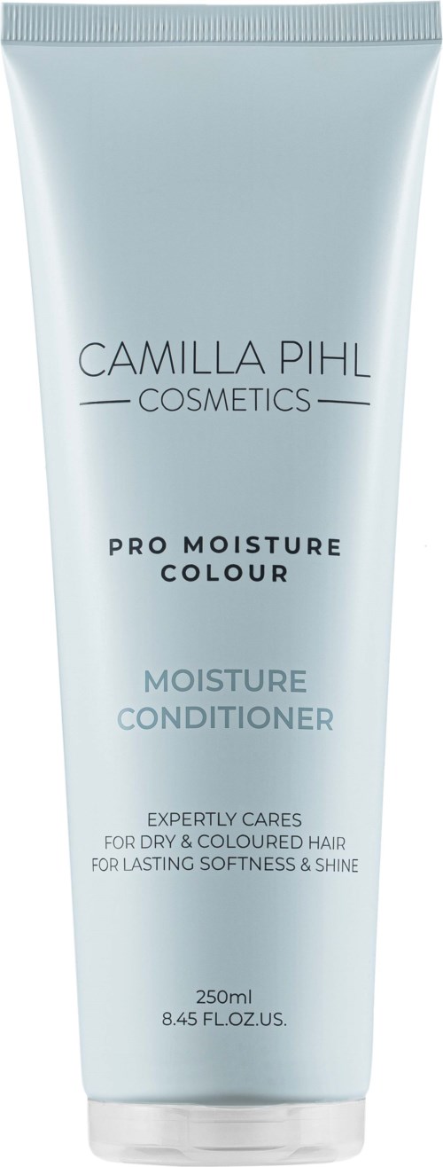 Een witte tube van Camilla Pihl Cosmetics Pro Moisture Colour Moisture Conditioner met productnaam en beschrijving.