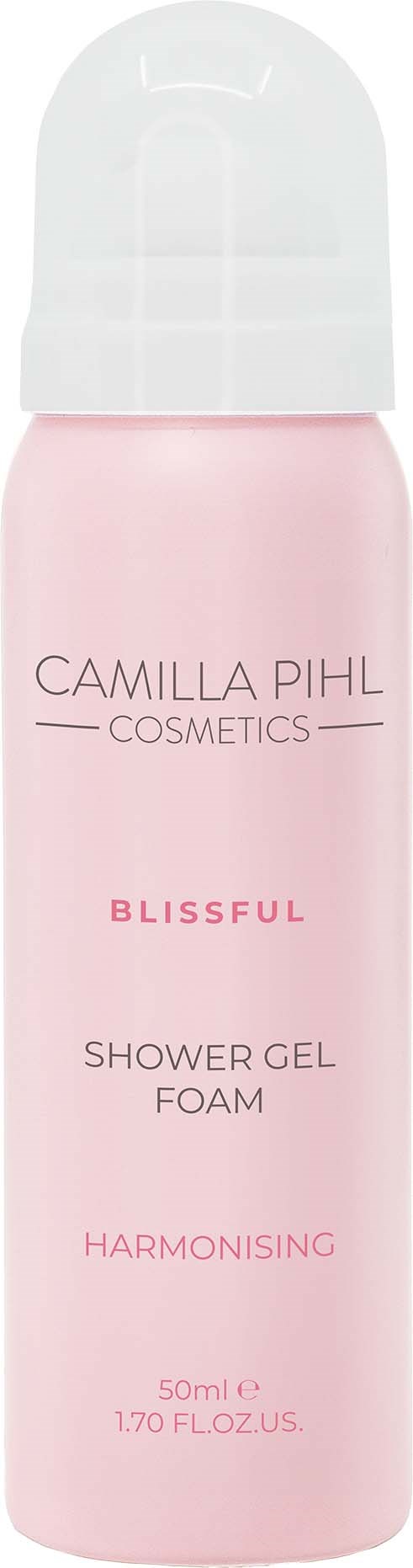 En rosa flaska av Camilla Phil Cosmetics Blissful Shower Gel Foam med vit lock, som främjar harmonisk doft.