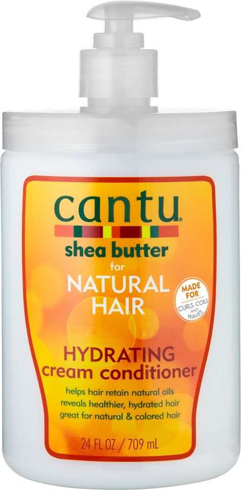 Biała butelka z pompką, oznaczona Cantu Shea Butter do naturalnych włosów, nawilżający odżywka dla naturalnych i farbowanych włosów.