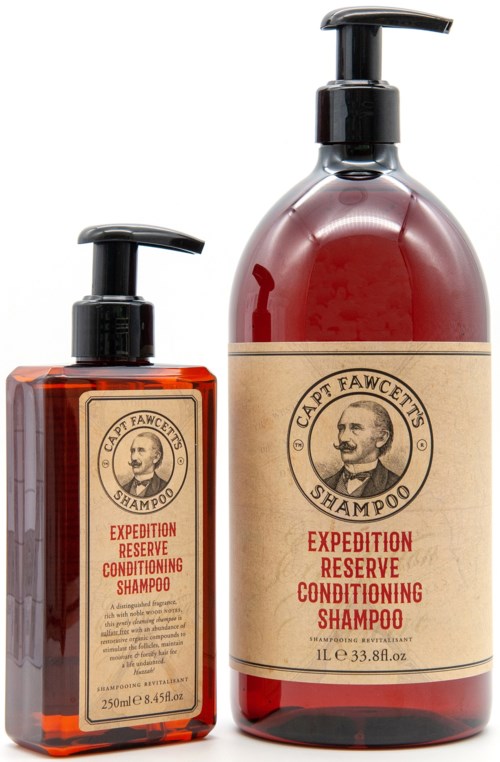 Two bottles of shampoo, one small and one large, with beige labels and black pump caps. They are from Captain Tawncett's.