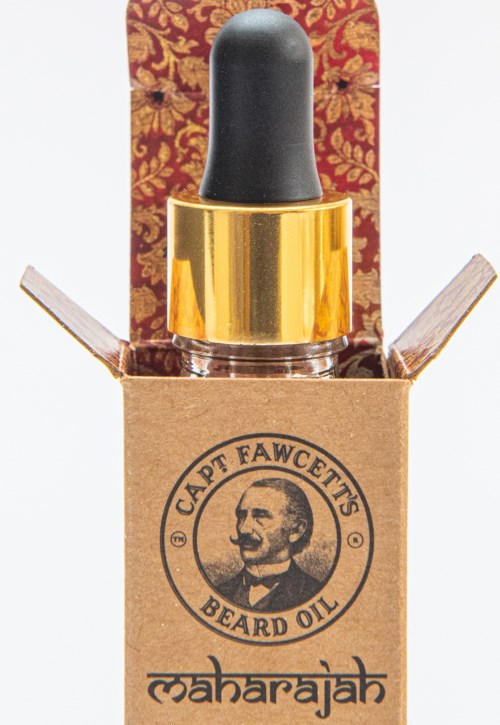 A small dropper bottle with a label saying 'Captain Fawcett's Beard Oil' and 'Maharajah'.