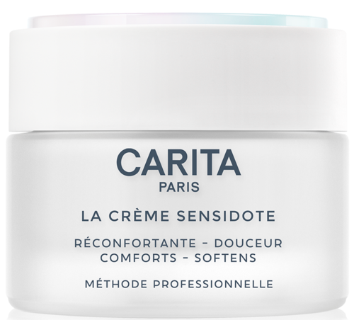 En hvit krukke merket 'Carita Paris La Crème Sensidote' med ord om komfort og mykhet, og et hvitt lokk.