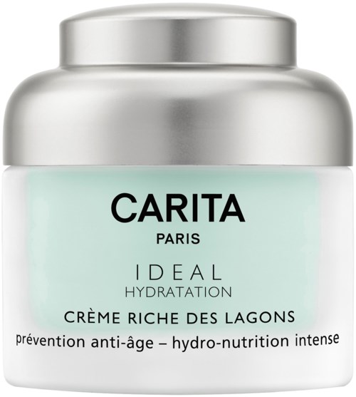 En burk med anti-åldrande kräm för djup återfuktning och hudskydd, från Carita Paris, i ljusgrönt och silver.