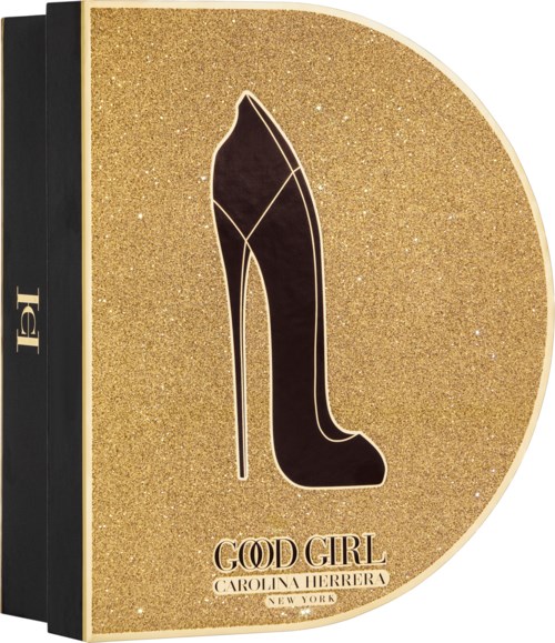 Logotyp av en svart högklackad sko på en glitterguldig bakgrund, med orden "GODD GIRL" och designerns namn.