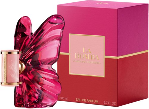 A pink butterfly-shaped perfume bottle next to a matching pink box with gold accents.