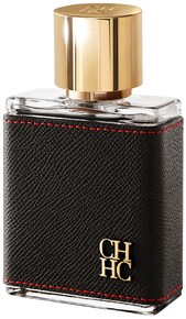 Butelka perfum z złotą nakrętką i czarną teksturowaną etykietą, z literami "CH" i "HC".