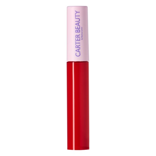Ett rött läppstift med ljusrosa lock märkt 'CARTER BEAUTY'.