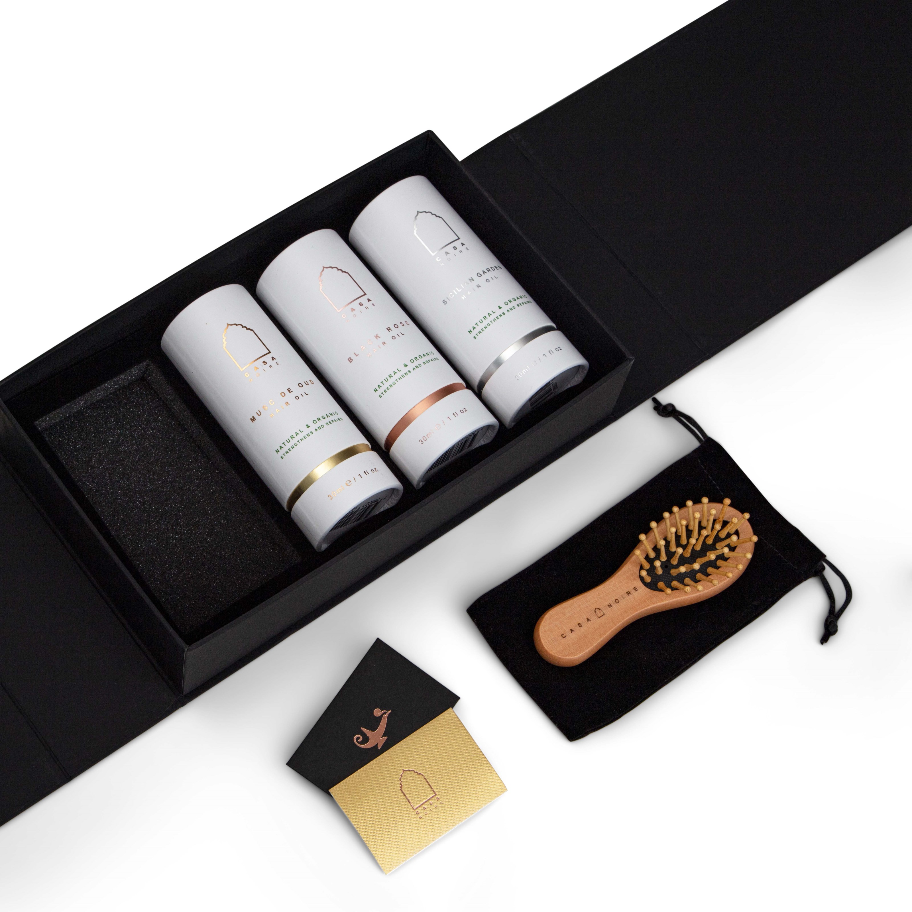 Läs mer om Casa Noire Gift Box 3 Hair Oils + Brush