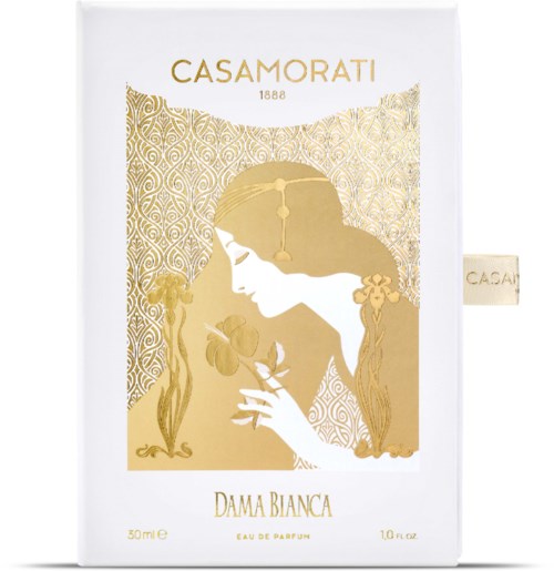En vit box med en guldbild av en kvinna som doftar på en blomma, dekorativa mönster och texten 'Casamorati' och 'Dama Bianca.'