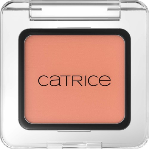 Een compacte blush in een doorzichtige kunststofcase met de merknaam Catrice. De blush is perzikkleurig.