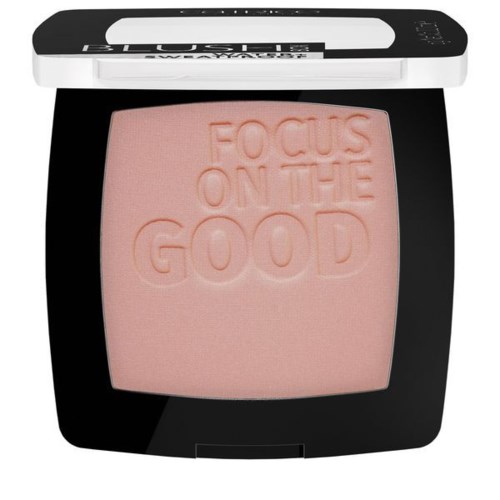 A pink makeup blush compact with the words "FOCUS ON THE GOOD" embossed on the surface.
