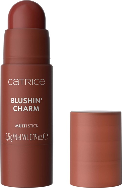 En sminkstift merket 'Blushin' Charm' fra Catrice, med lokket av, som viser en brunaktig farge.