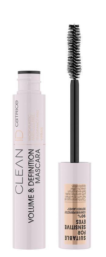 En mascara-rör med en öppen borste som visar borststrån, märkt 'Volume & Definition', med vit och svart design.