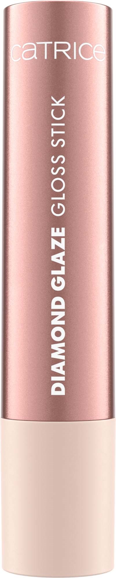 Vaaleanpunainen sylinterimäinen huulikiilto, jossa on valkoinen teksti. Siinä lukee 'CATRICE' ja 'DIAMOND GLAZE GLOSS STICK'.