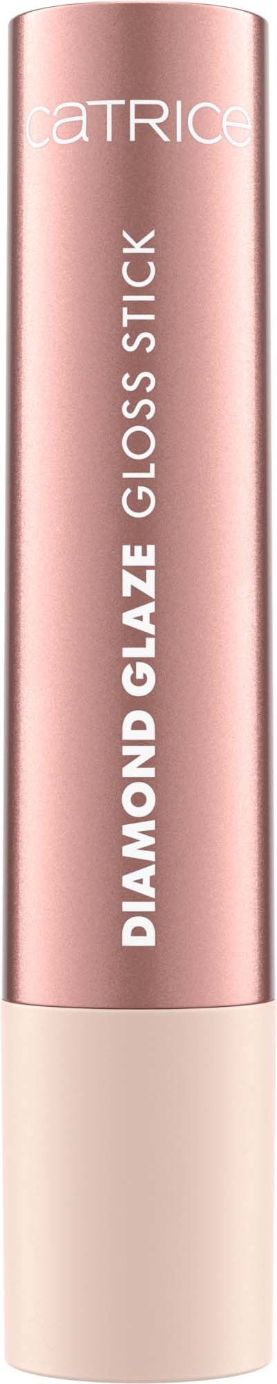 Een roze en beige cilindervormige lipgloss stick met merk en productnaam verticaal geschreven.