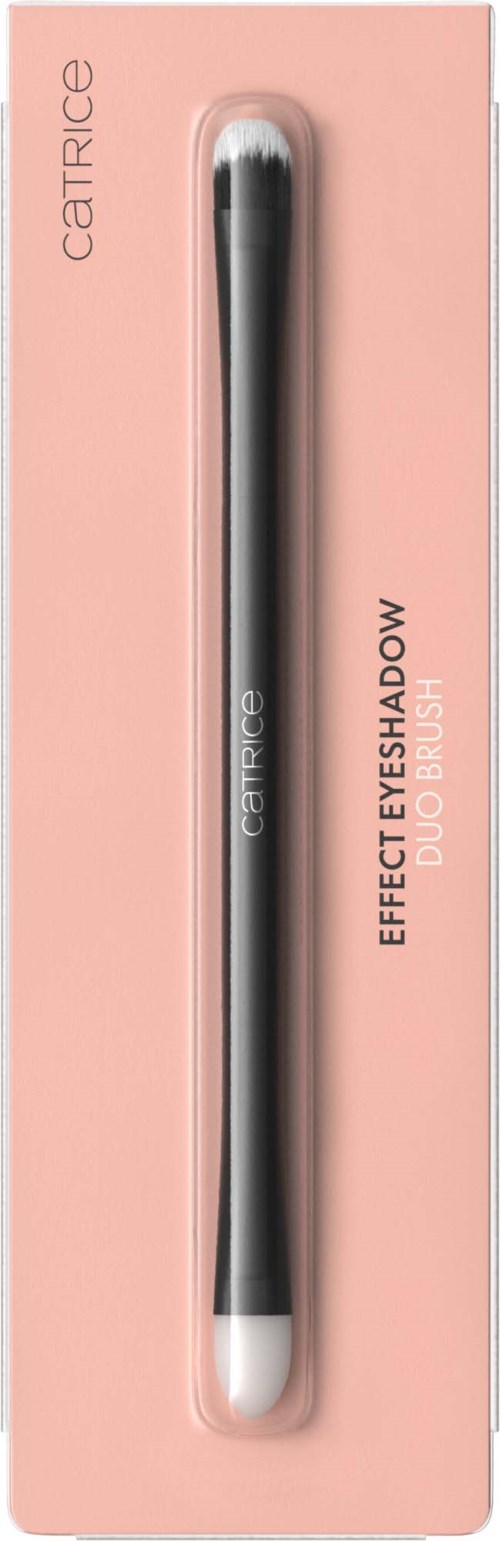 En sminkborste i rosa förpackning med svart och vit handtag, märkt 'Effect Eyeshadow Duo Shadow.'