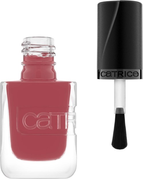 Een nagellakfles met roze kleur en een zwarte kwastendop ernaast.