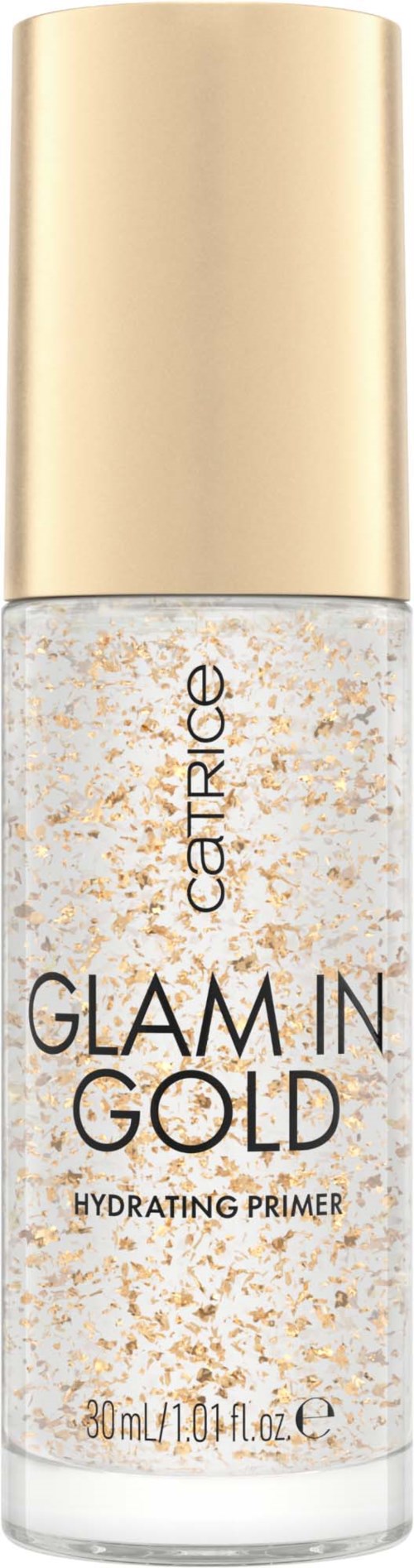 En tydlig flaska med guldlock, märkt 'Glam in Gold' fuktgivande primer, innehåller små guldflingor.