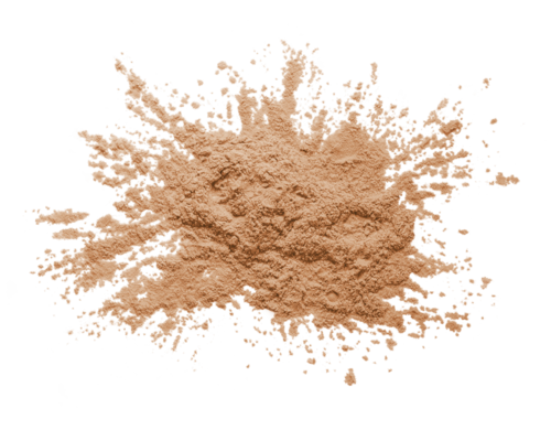 Ett beige pulver spritt på en svart bakgrund. Det ser fint och mjukt ut.