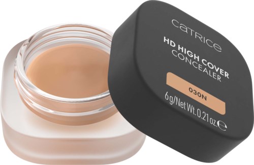Ett kryss med concealer med svart lock som visar produktdetaljer och den beige makeupen synlig inuti.