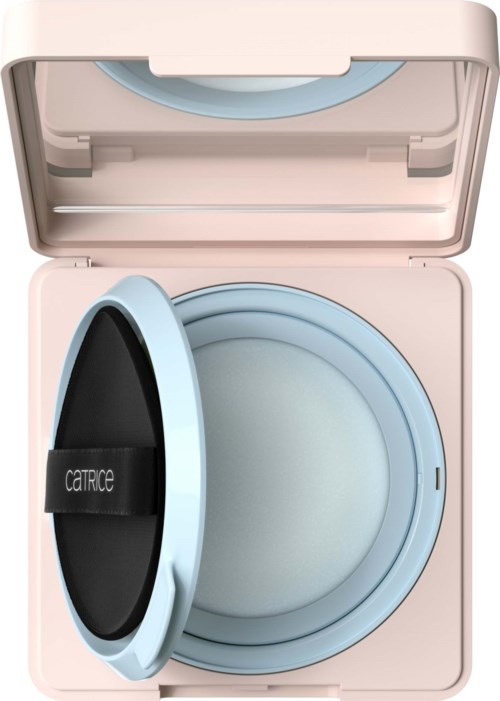 A light pink compact case containing a sponge applicator and a mirror inside the lid.