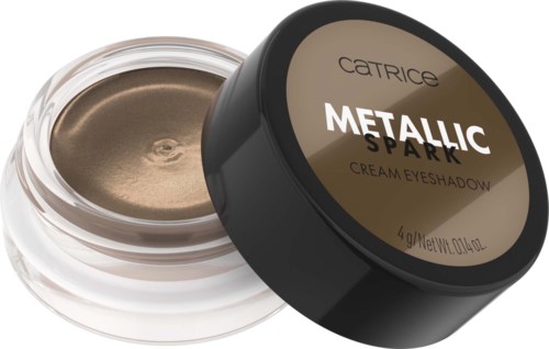Pieni purkki kullankeltaista luomiväriä, jossa nimi "Metallic Spark." Musta kansi vieressä.