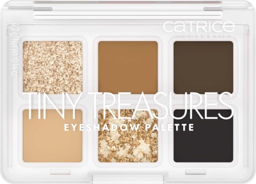 Six eyeshadow colors in a transparent palette, including gold, brown, black, and beige shades.
