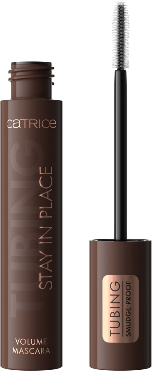 Brun mascara-flaske med børste, merket "Stay in Place" og "Tubing" for vannfast og smussikkert bruk.